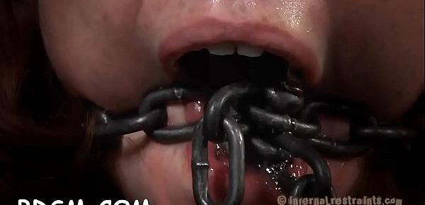  Gagged and tied up slave is being pleasured with marital-device